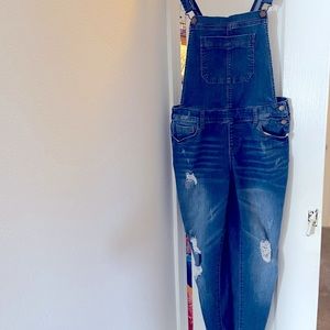 Distressed Skinny jeans overalls sz Lg.